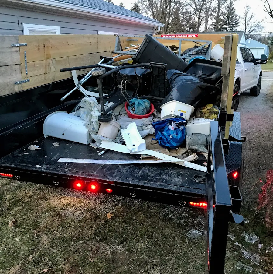 Roll-off dumpster delivered to a residential driveway in Big Flats